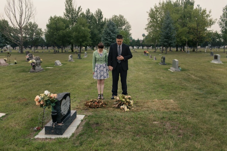 Image: Frederick Lee and Colleen Timmins-Lee return to the grave of their son, Michael Lee, 13