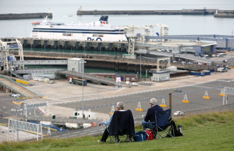 Image: The busy ferry port can be watched from Dover's white cliffs