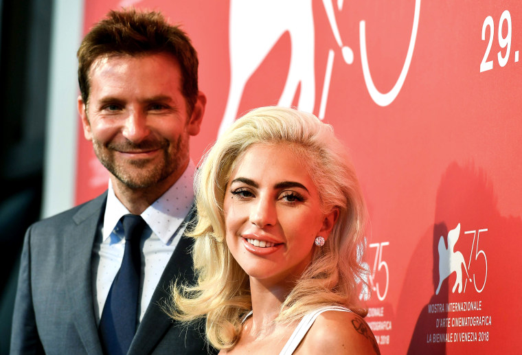 Image: Singer and actress Lady Gaga and director and actor Bradley Cooper attend a photocall for the film "A Star is Born"