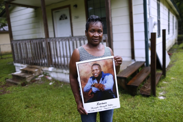 Image: Alma Dunning, mother of Lucious Bolton, holds a photo of her son