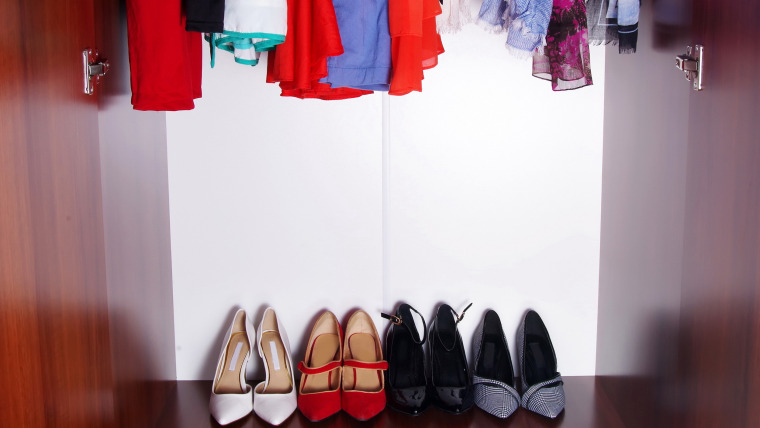 Closet with shoes and clothes