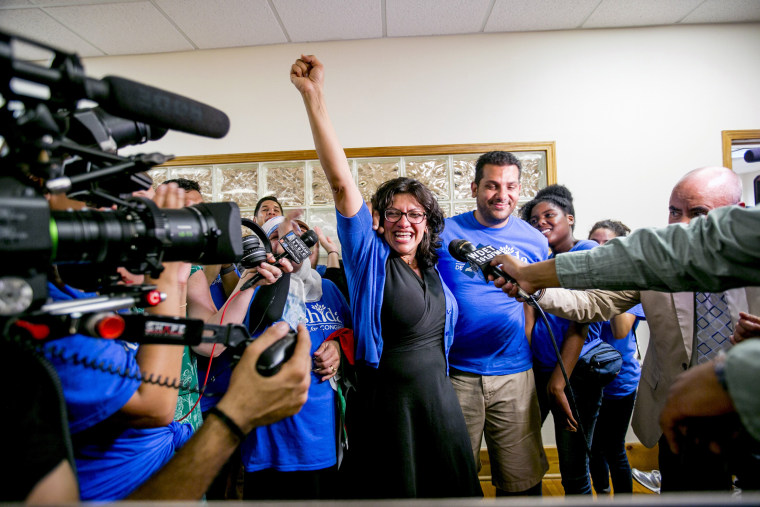 Image: Rashida Tlaib celebrates at her campaign headquarters in Detroit after winning the Democratic primary race to succeed longtime Rep. John Conyers (D-Mich.) on Tuesday, Aug. 7, 2018.