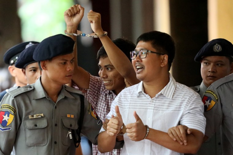 Image: Detained Reuters journalist Wa Lone and Kyaw Soe Oo arrive at Insein court in Yangon last month.