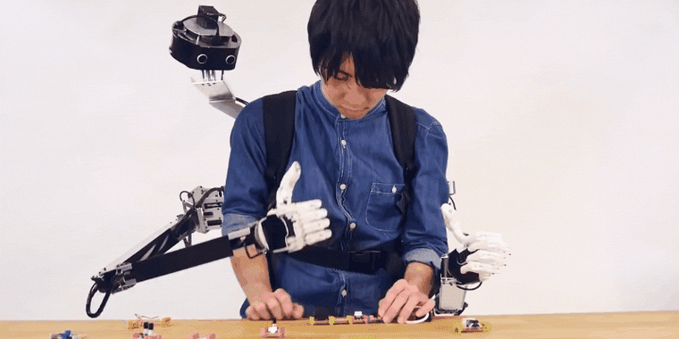 The prototype system consists of a set of human-like robotic arms and a robotic "head" equipped with stereo vision and microphones.
