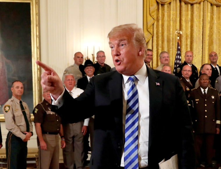 Image: U.S. President Donald Trump speaks during a meeting with sheriffs from across the country at the White House in Washington