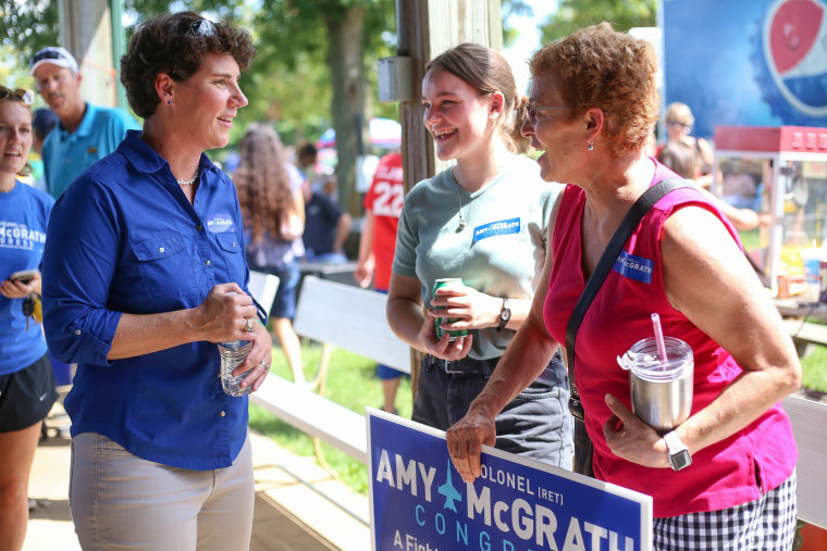 Image: Democratic candidate for Congress Amy McGrath speaks with supporters