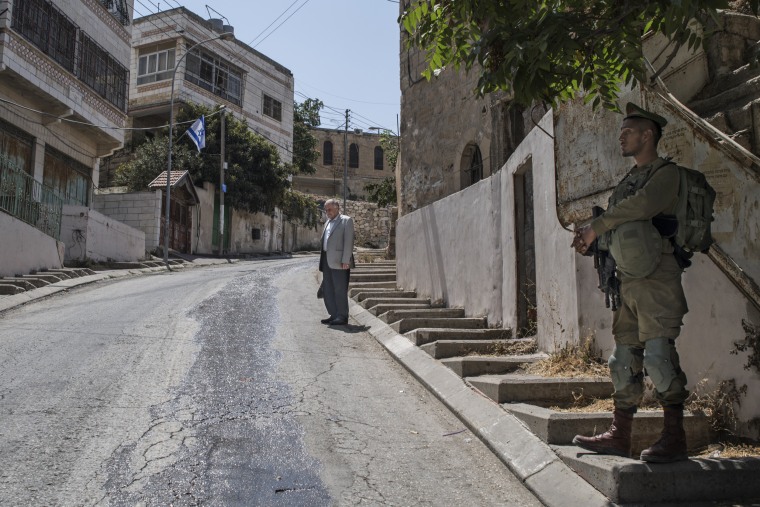 A Palestinian man near one of the many checkpoints in Hebron.