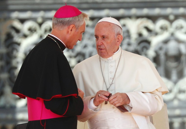 Image: Pope Francis talks with Archbishop Georg Ganswein during the Wednesday general audience in Saint Peter's square at the Vatican