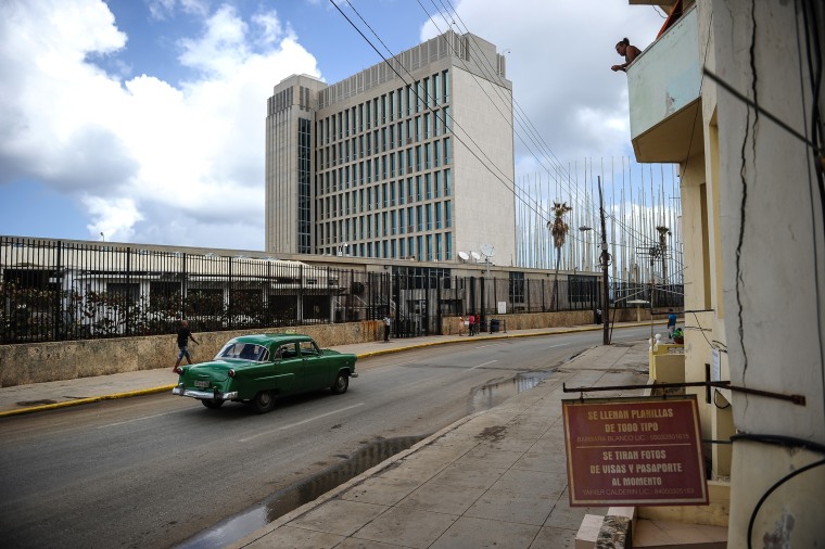 Image: A car passes the U.S. embassy in Havana on Oct. 3, 2017.