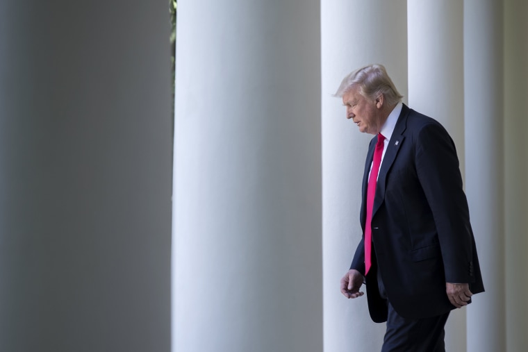 Image: Trump walks from the Oval Office to the Rose Garden