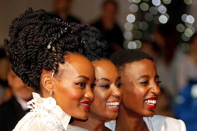 Image: Director Wanuri Kahiu of \"Rafiki\" poses with actors Sheila Munyiva and Samantha Mugatsia during the 71st Cannes Film Festival in Cannes, France, May 9, 2018.