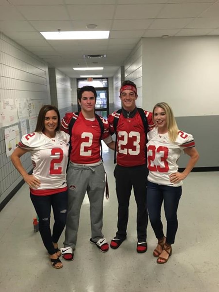 Lake Mary High School teachers Michelle Schwartz and Stephanie Black agreed to wear football team members Michael Cardegnio and Kolten Mortimer's jerseys at the pep rally to show support for the team.