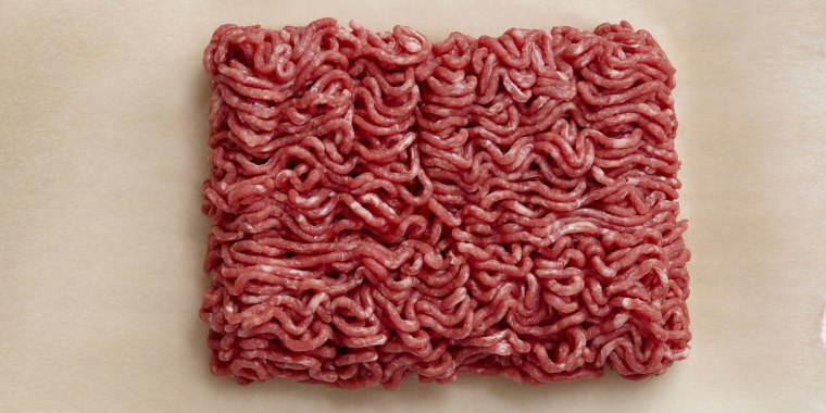 Raw minced beef on wax paper