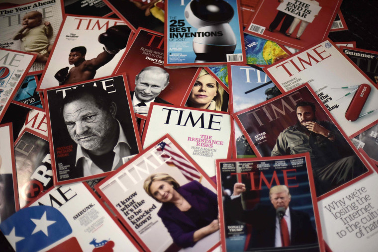 Image: Copies of Time magazine are displayed on a table in Washington