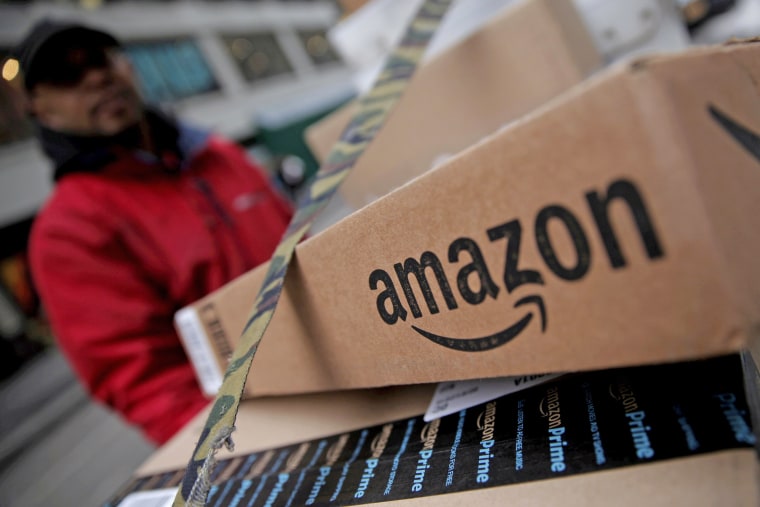 Image: FILE PHOTO: Amazon boxes are seen stacked for delivery in Manhattan