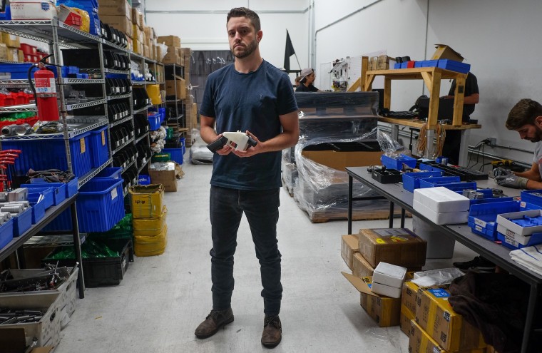 Image: Cody Wilson, owner of Defense Distributed company, holds a 3D printed gun, called the Liberator