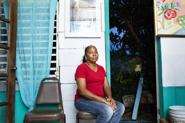 Image: Dulce Morreta-Diaz, 53, in her home at Valle Hill in Canovanas, Puerto Rico