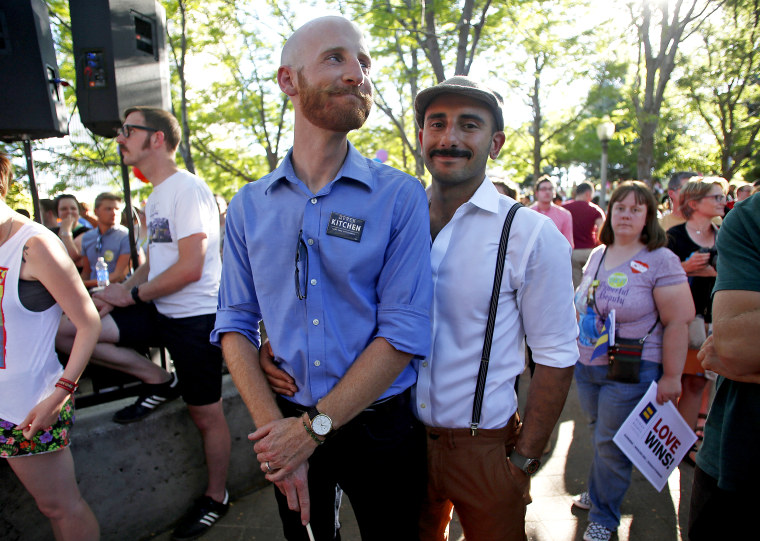 Derek Kitchen and his husband Moudi Sbeity celebrate the United States Supreme Court's landmark decision that legalized same-sex marriage throughout the country in Salt Lake City