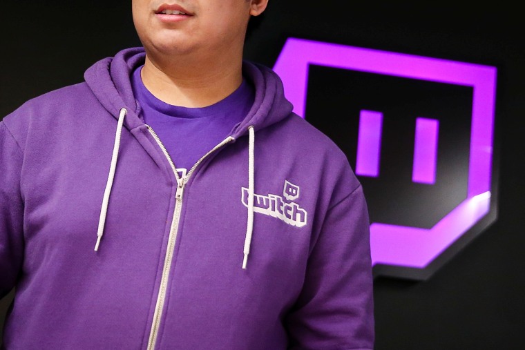A man leaves the offices of Twitch Interactive Inc, a social video platform and gaming community owned by Amazon, in San Francisco, California