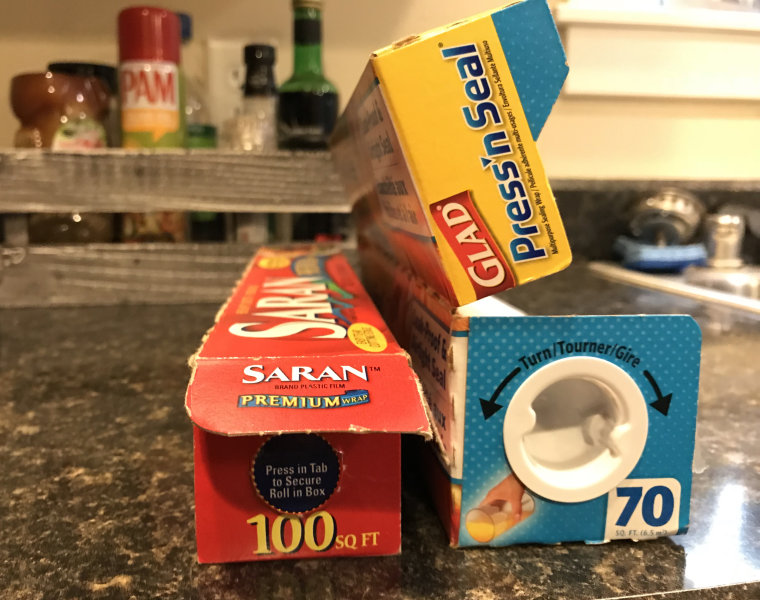 tabs on the side of plastic wrap boxes