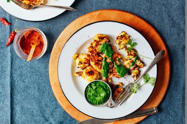 For a 30-minute weeknight meal, try this Cauliflower Steak seasoned with a smoky shawarma spices blend, roasted until tender with a crust, and served with chutney, from Minimalist Baker. 