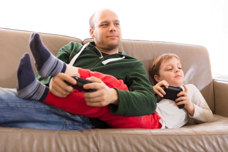 Image: Parent, child Playing video games