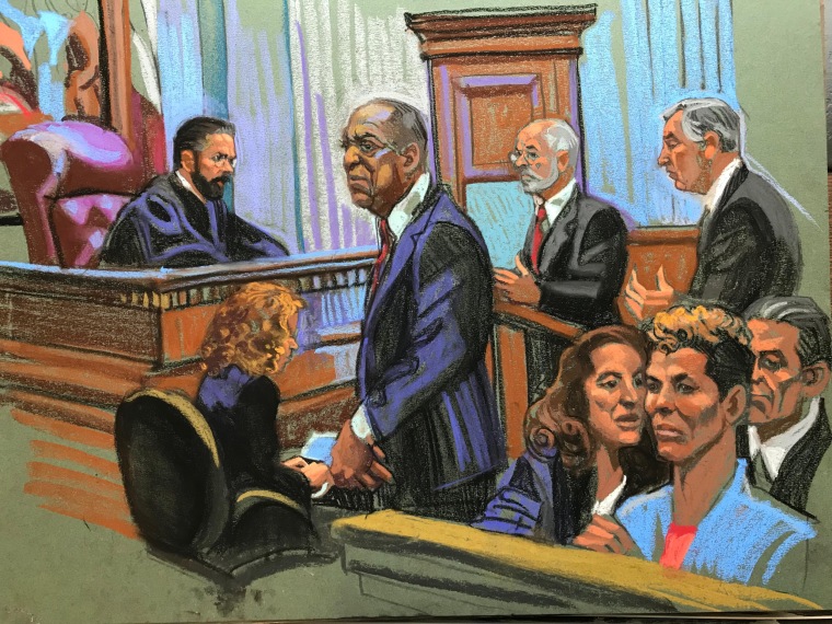 Bill Cosby stands during his sentencing in this courtroom sketch from Sept. 25, 2018.