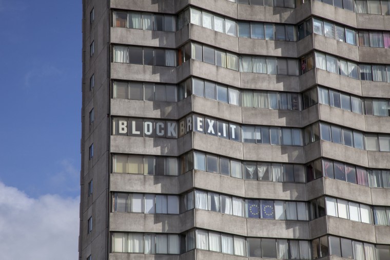 Image: Rob Yates' apartment features "Block Brexit" message in its windows.
