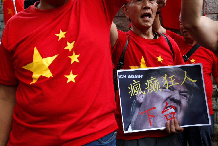 Image: Protesters demonstrate against Donald Trump outside the U.S. Consulate in Hong Kong