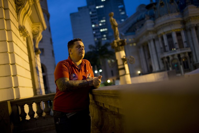 Image: Transgender Cristian Lins stands outside City Hall at the end of an interview in Rio de Janeiro, Brazil