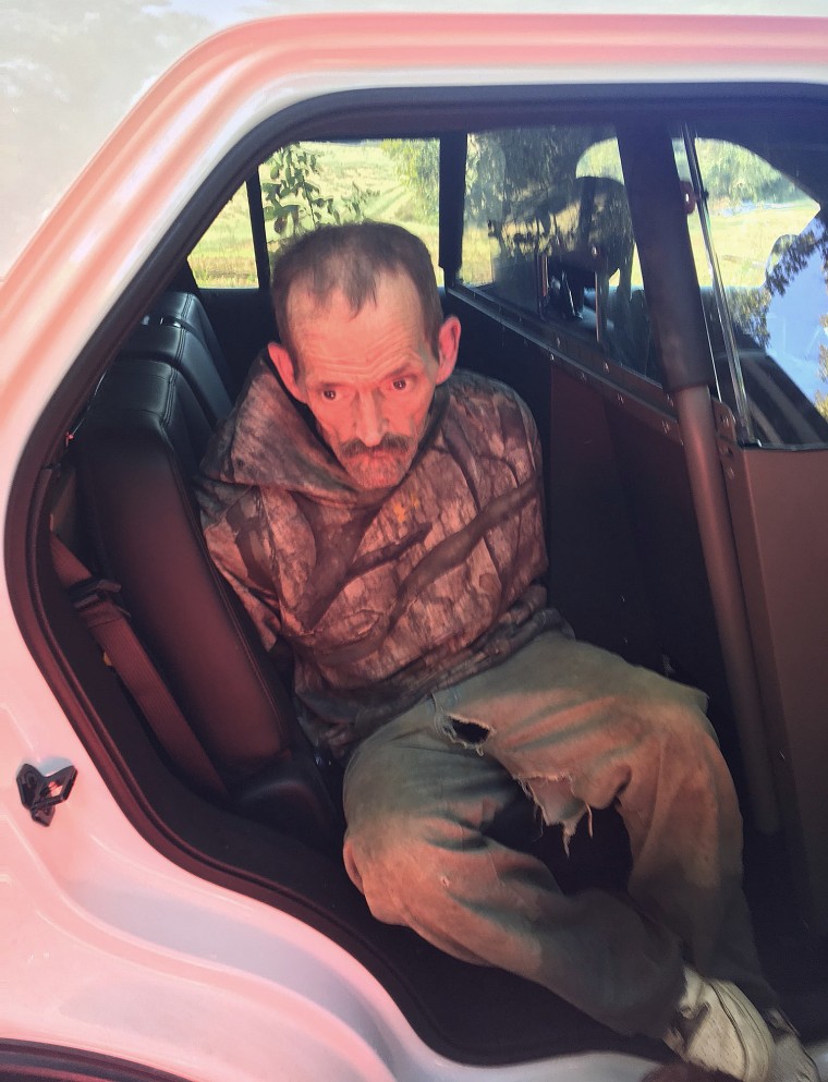 Montgomery and Stewart County homicide suspect Kirby G. Wallace in cuffs in a Stewart County Sheriff's patrol car on Oct. 5, 2018.