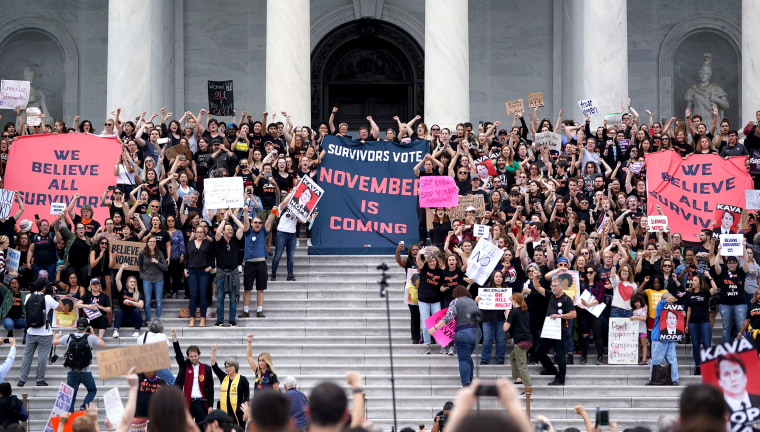 Protesters pound the doors of the Supreme Court following Kavanaugh confirmation