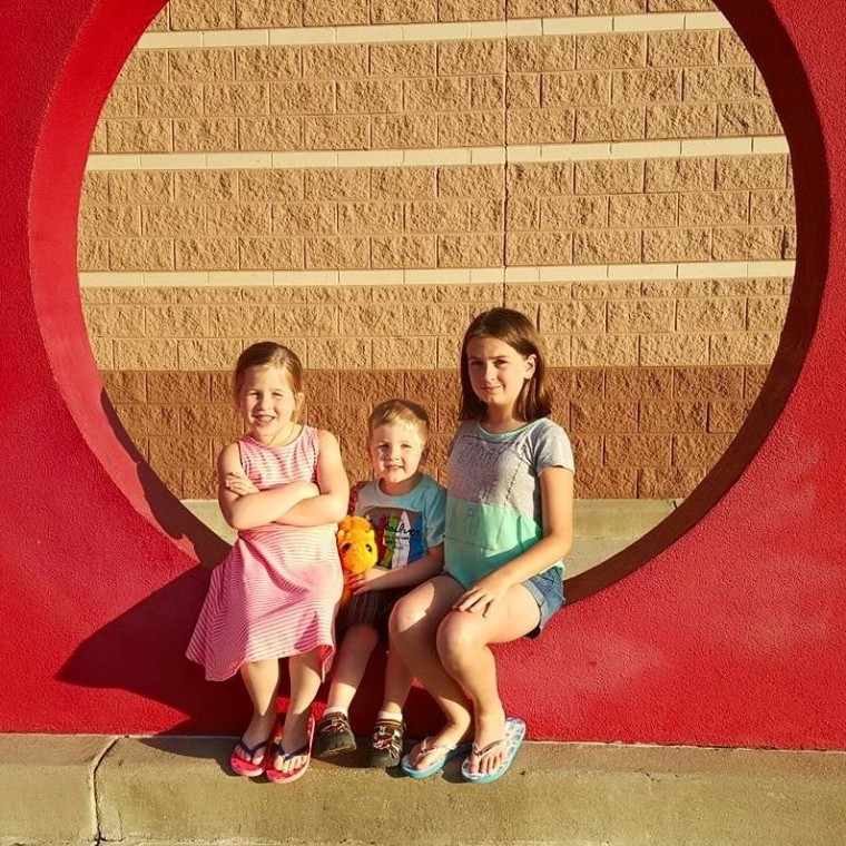 Carter Roberts and his two sisters before he was diagnosed with acute flaccid myelitis.