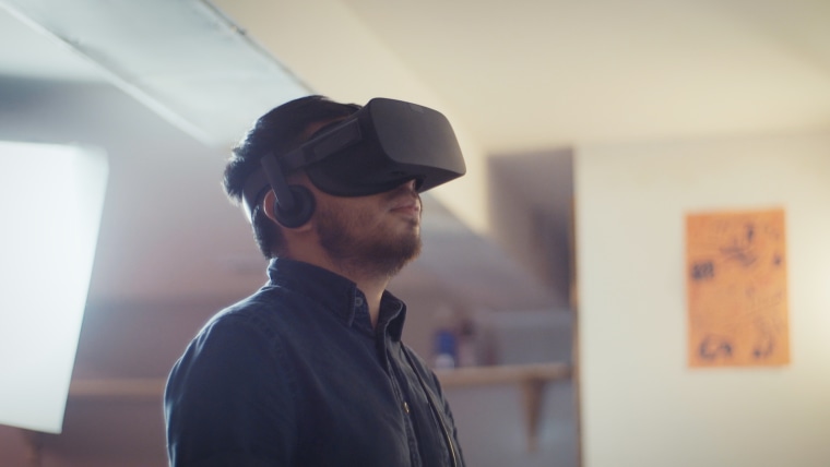 Frisly Soberais using a VR headset.