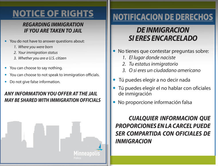 Minneapolis immigrants rights placards in English and Spanish