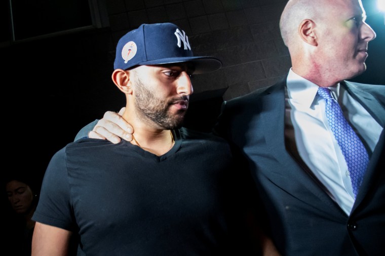 Image: Nauman Hussain leaves with his lawyer Lee Kindlon after posting bond at Cobleskill Town Court in Cobleskill