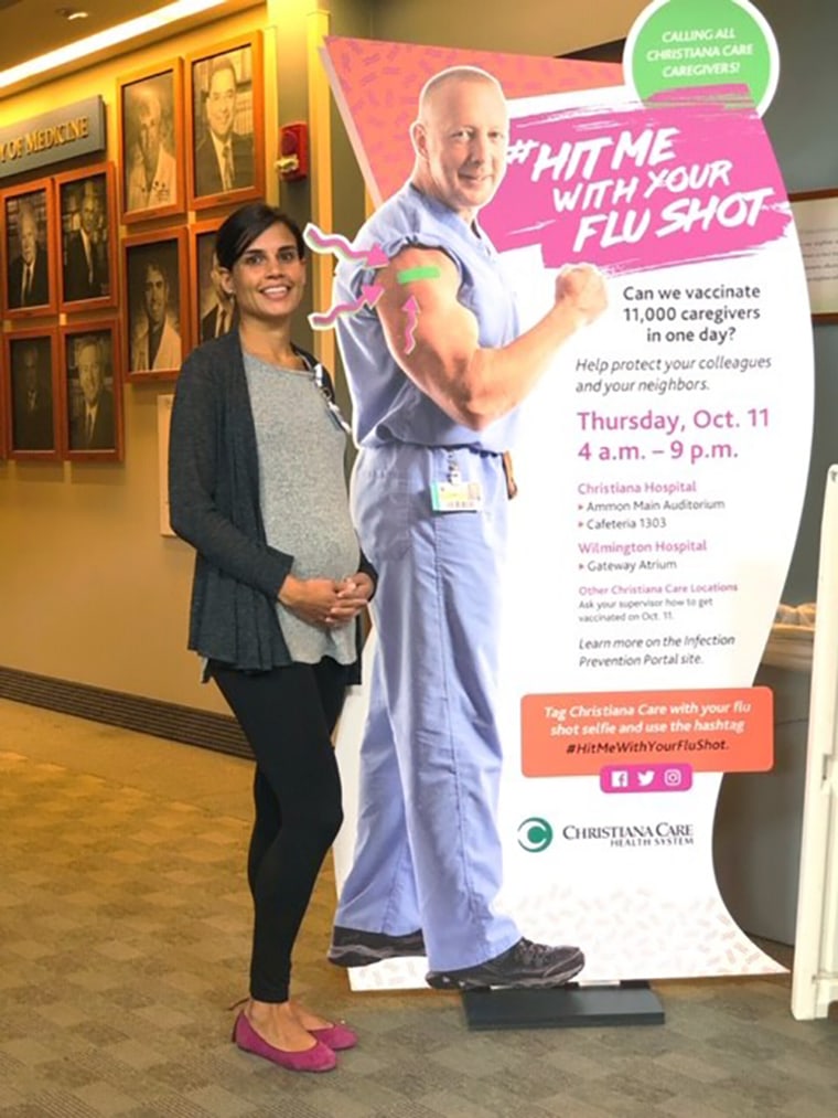 Nicole Harrington, a pharmacist at Christiana Hospital, got a flu vaccine during a mass vaccination event in Wilmington, Delaware