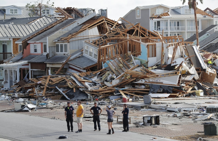 Rescue personnel perform a search in the aftermath of Hurricane Michael in Mexico Beach