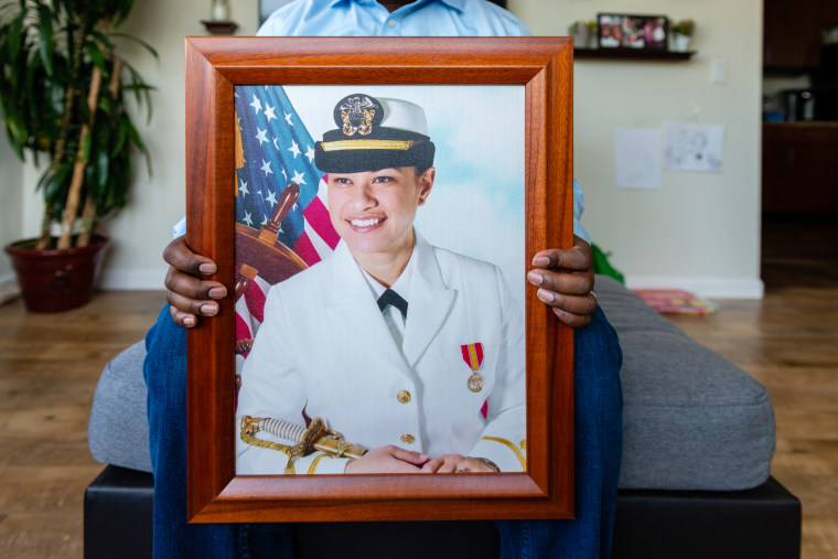 Walter Daniel, a former Coast Guard officer, holds a photograph of his wife, Navy Lt. Rebekah Daniel, known as “Moani.” She died hours after giving birth to their daughter, Victoria, at the Naval Hospital Bremerton.  Daniel says the low-risk pregnancy of his healthy 33-year-old wife never should have ended in tragedy.  He filed a wrongful-death lawsuit that was blocked by the Feres Doctrine.