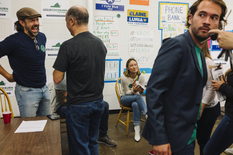 Jason Sudeikis, left, and Olivia Wilde, center, before canvassing for Olivia's mother in Charlottesville. 