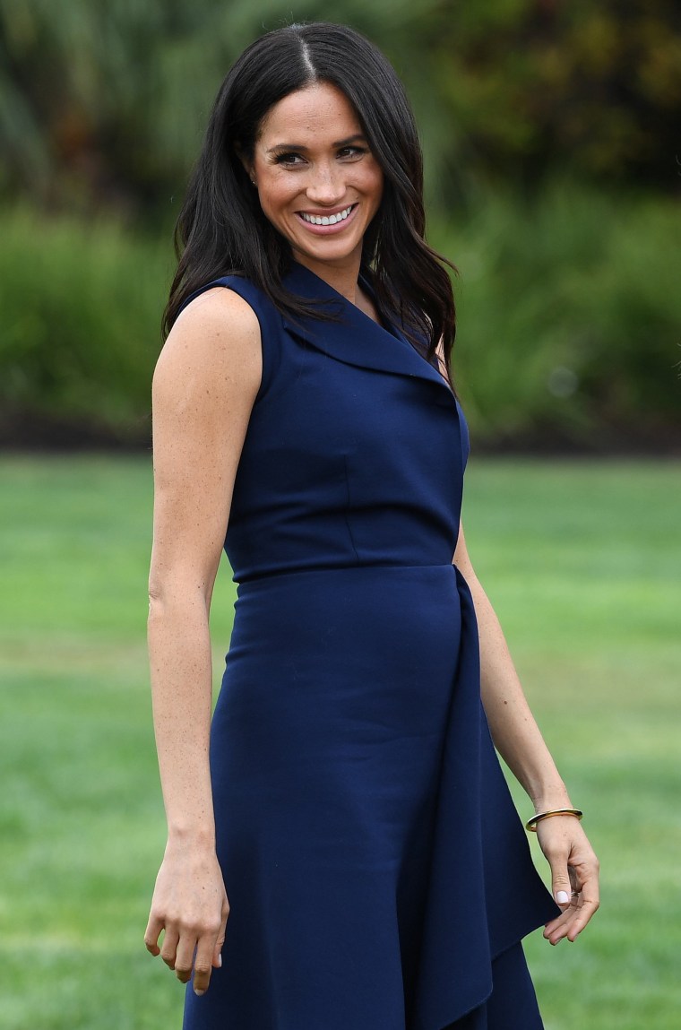 Duchess Meghan showing