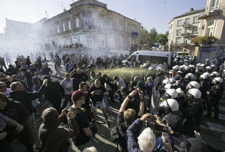 Polish police used tear gas and a water cannon against right-wing extremists who were trying to block the first equality parade in the city of Lublin in eastern Poland on Oct. 13, 2018.