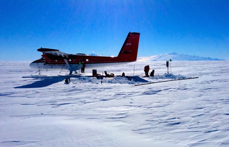 Researchers work at the Ross Ice Shelf seismic station