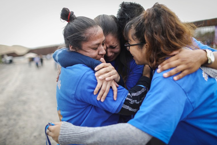 Image: Hugs Not Walls Event Briefly Reunites Families At US-Mexico Border Wall