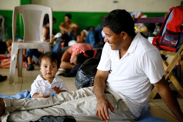 Migrants heading in a caravan to the U.S. rest at a temporary shelter in Ciudad Hidalgo, Chiapas state, Mexico, on Oct. 20, 2018