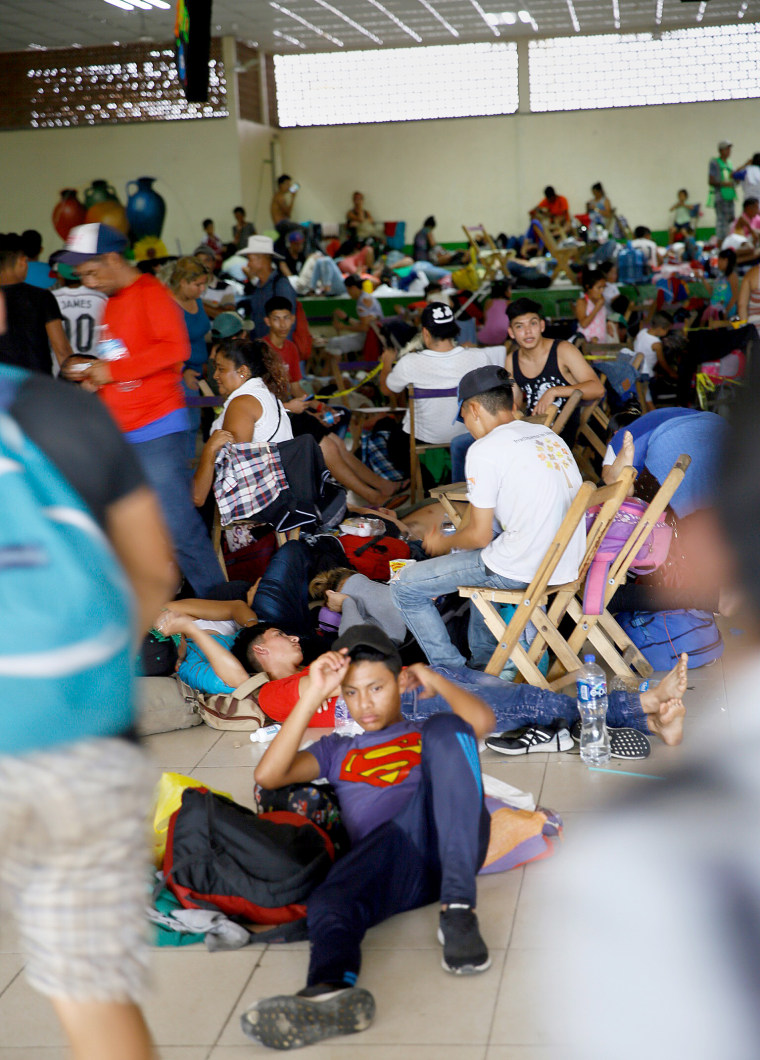 Migrants heading in a caravan to the U.S. rest at a temporary shelter in Ciudad Hidalgo, Chiapas state, Mexico, on Oct. 20, 2018