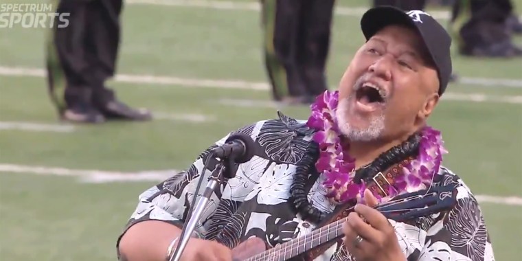 Hawai'ian singer sings the national anthem.