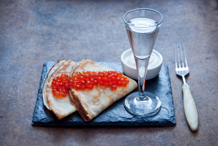 Blini with red caviar and vodka