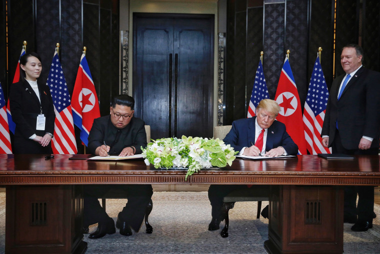 Image: President Donald Trump and Kim Jong-un at their historic Singapore summit in June