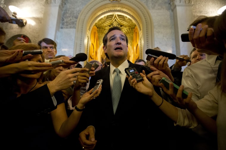 Image: U.S. Senator Ted Cruz (R-TX) leaves the U.S. Senate Chamber after a marathon attack on Obamacare at the U.S. Capitol in Washington